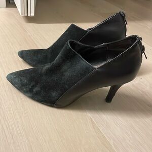 Heeled leather and suede booties